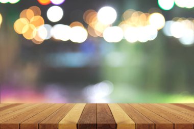 empty wooden table and blurred bokeh background