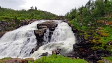 One of Norways largest waterfalls on the way from Hardangervidda