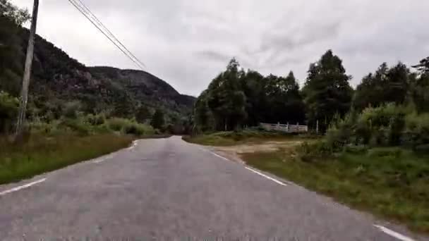 First Person View Nordic Two Lane Road Forest Mountains — Stockvideo