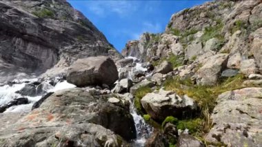 Norway, Buarbreen. Flowing stream fresh water clear