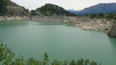 View of Lac d'Emosson and the dam in the mountains of Valais in Switzerland
