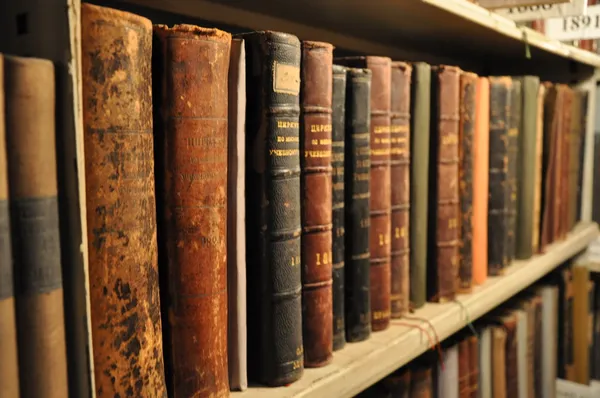 Vintage books in library Stock Photo