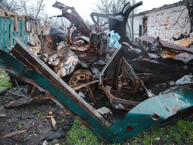 War in Ukraine, completely destroyed civilian car, Kyiv region