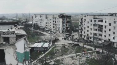 The war in Ukraine, the drone flies backwards and flies through the remains of an apartment building, Borodyanka, aerial photography