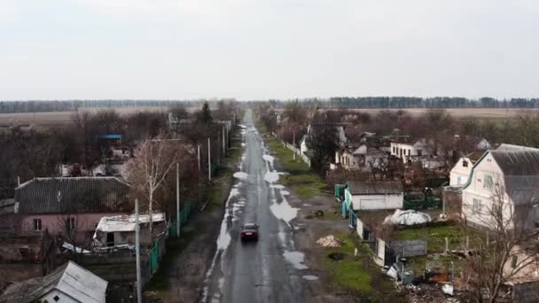 War in Ukraine, Shot and half-destroyed village Andriivka, village after the shelling, destroyed civilian houses, Kyiv region, aerial photography
