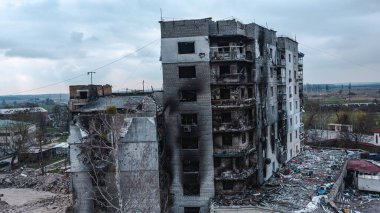 War in Ukraine, Borodyanka, almost destroyed apartment building, destroyed and burned apartments, drone view, aerial photography