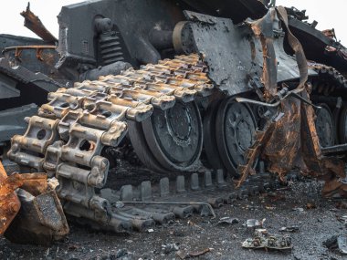 The war in Ukraine, a blown up tank, a torn hull, a broken tank chassis
