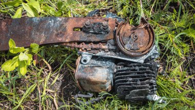 The war in Ukraine, burned and damaged chainsaw