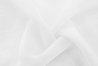 Beyaz kumaş. Kumaşın dokusu, kıvrımları ve dalgaları olan açık renkli bir tonda kumaş veya saten. Kumaş