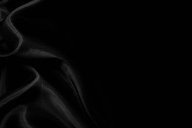 Sanat eserlerinin arka planı ve dekorasyonu için kumaşın koyu kumaş dokusunun bir parçası, güzel buruşmuş ipek ya da keten deseni. Buruşuk bir kumaş parçası.