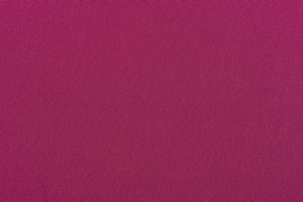 背景是紫色 紫色的材料 在深色阴影下缝制衣服用的织物 — 图库照片