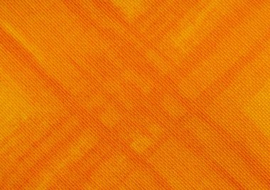 Soyut çizgileri ve dalgaları olan turuncu bir kumaş parçası. Sarı tekstil. Perde. Tulle veya saten