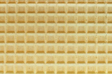 Gofret. Sarı waffle 'ların arka planı. Hamur işi. Tatlılık.