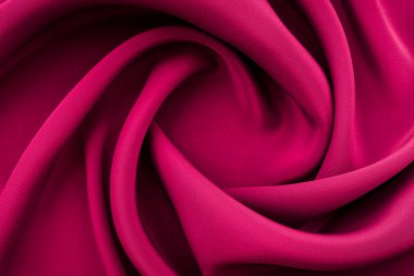 Bir parça bordo, menekşe, kırmızı bez. Arka plan ve tasarım çalışmaları için kumaş dokusu, güzel buruşuk ipek ya da keten deseni. Buruşuk bir kumaş parçası.