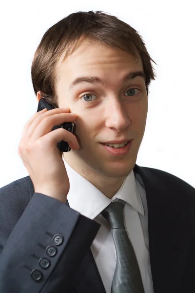 Young professional talks on the phone — Stock Photo, Image
