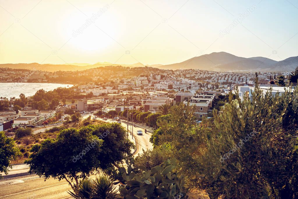 Panoramic view of Gumbet District of Bodrum, mediterranean city in Turkey on aegean coast in sunset. Toned image.