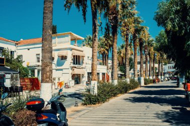 Bodrum, Turkey, 1st August 2022: Walk through Marina bay in city of Bodrum on aegean coast of Turkey. Toned image.