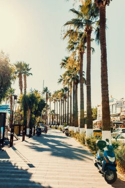 Bodrum, Turkey, 1st August 2022: Walk through Marina bay in city of Bodrum on aegean coast of Turkey. Toned image.