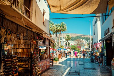 Bodrum, Turkey, 1st August 2022: Walking tour on the streets of centar Bodrum area on Aegean coast of Turkey during summer vacation.