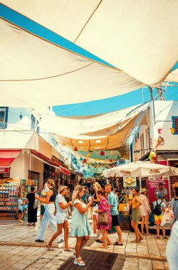 Bodrum, Turkey, 1st August 2022: Walking tour on the streets of centar Bodrum area on Aegean coast of Turkey during summer vacation.