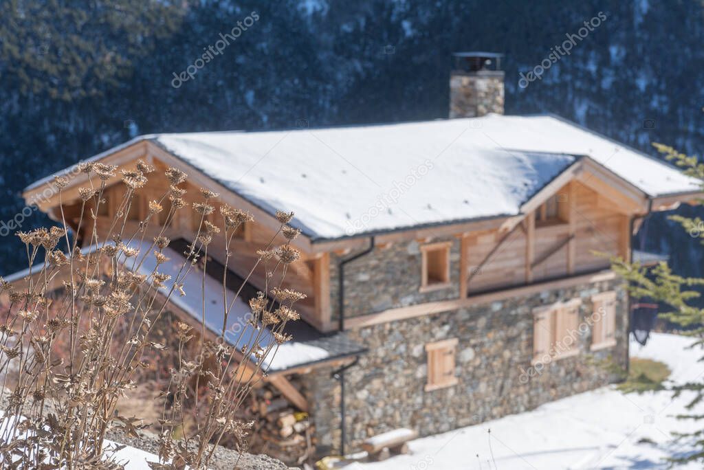 Mountain cabin in the Pyrenees of Andorra in Winter.