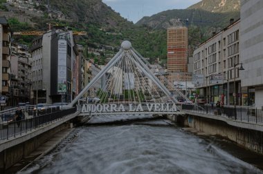Andorra la Vella, Andorra. 2022 May 18 . Pont de Paris in the background and the work of Salvador Dali Nobleza del Tiempo in summer 2022.