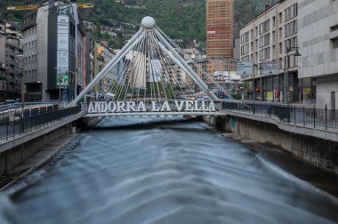 Andorra la Vella, Andorra. 2022 May 18 . Pont de Paris in the background and the work of Salvador Dali Nobleza del Tiempo in summer 2022.