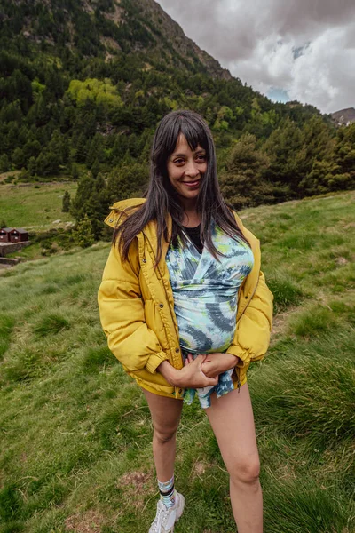 Young Latina mom with her baby in the mountains.