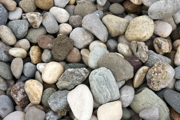 Fundo abstrato com pedras de seixos — Fotografia de Stock