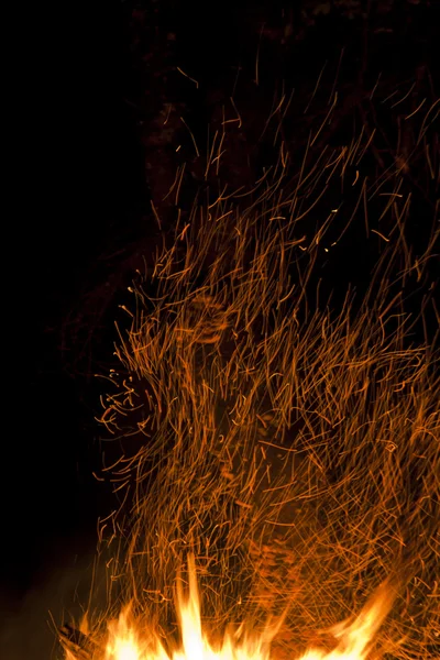 Long exposure photo of fire sparkles — Stock Photo, Image