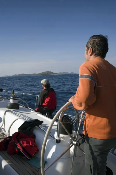 The skipper of a yacht still flying — Stock Photo, Image