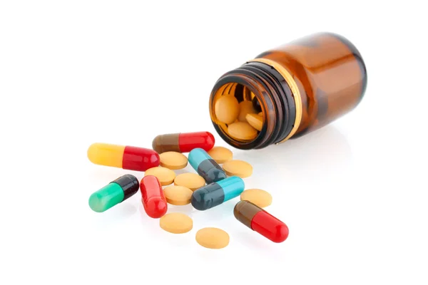 Tabletták és üveg Stock Kép