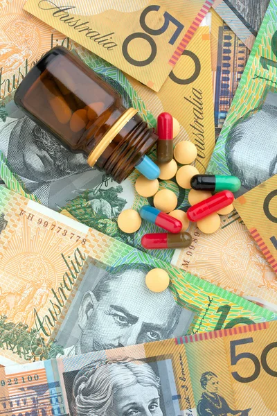 Pills and Australian dollars — Stock Photo, Image