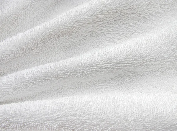 White soft wrinkle terry cloth blanket texture background, wallpaper, backdrop with Space for text.