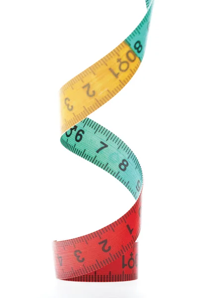 Spiral shaped colorued tape measurement — Stock Photo, Image