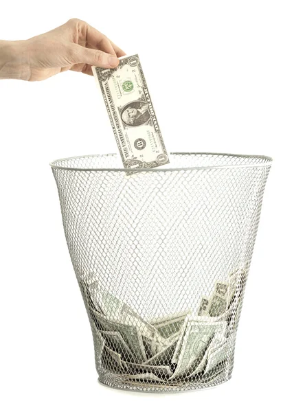 Money in bin and hand — Stock Photo, Image