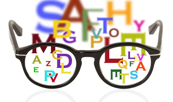Óculos e letras — Fotografia de Stock