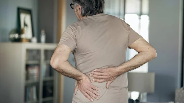 Senior Man Suffering Pain Lower Back Home — Stock Photo, Image