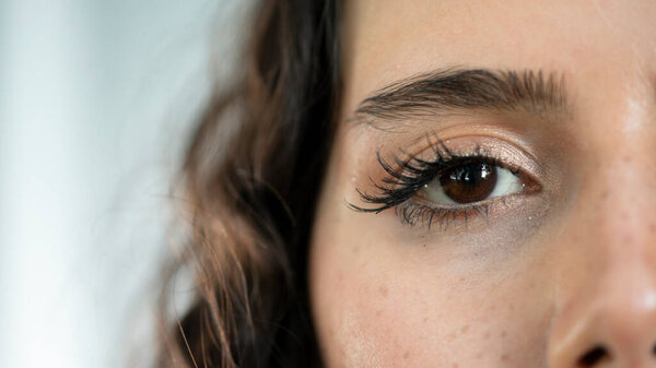 Closeup of a woman staring directly at the camera