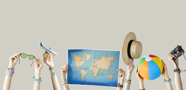 Many Different Arms Raised Holding Travel Objects — Stock Photo, Image