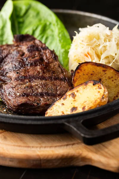 Grilled Steak Baked Golden Potatoes Served Sour Cabbage Red Sauce — Stock Photo, Image