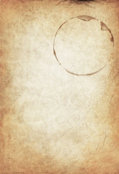 Mok cirkel op oud papier — Stockfoto