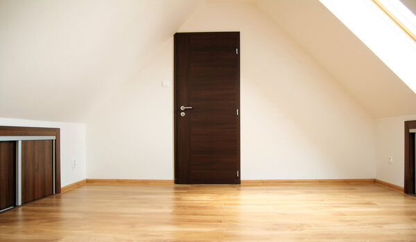 Door in empty loft room