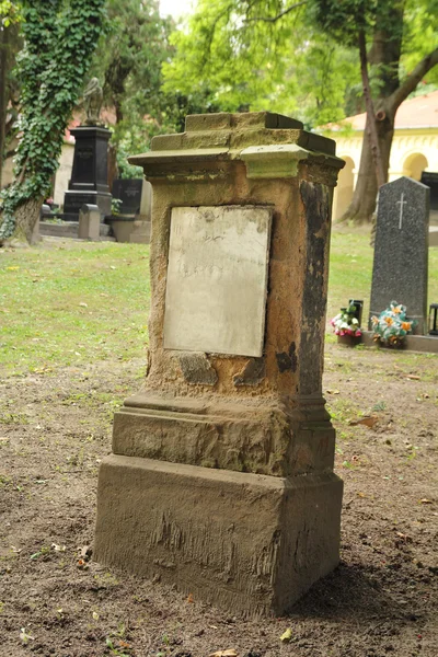 Worn tombstone — Stock Photo, Image