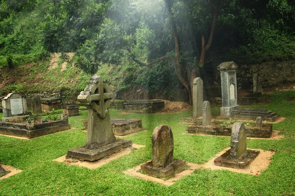 Old graveyard with light — Stock Photo, Image