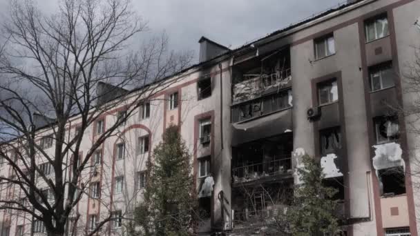 Aftermath shell of civilian bombed city shooting Ukraine genocide Russia. 2022 Russian invasion Ukraine war crime Bucha occupation. City destroyed building destruction city Bucha war Russia aggression — Stock Video