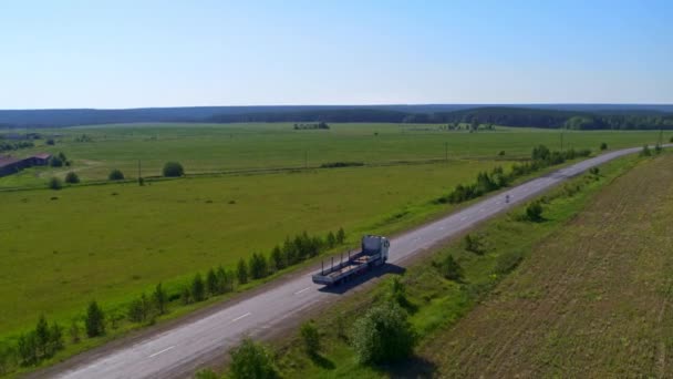 Aerial view of a truck on the highway in nature — Stock Video