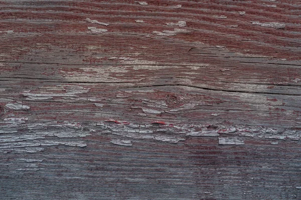 Textur av gamla träplankor. Närbild av shabby peeling färg på tavlor. Begreppet bakgrund för din text. — Stockfoto