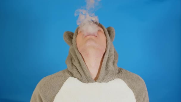Man Hoodie Ears Vapes Tipping His Head Back Male Lets — Stock Video
