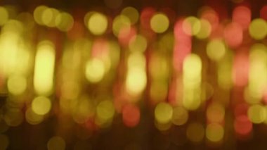 Parlak röflelerin dokusu. Parlak, bulanık bir arka plan. Bokeh. Parıldayan soyut arkaplan.